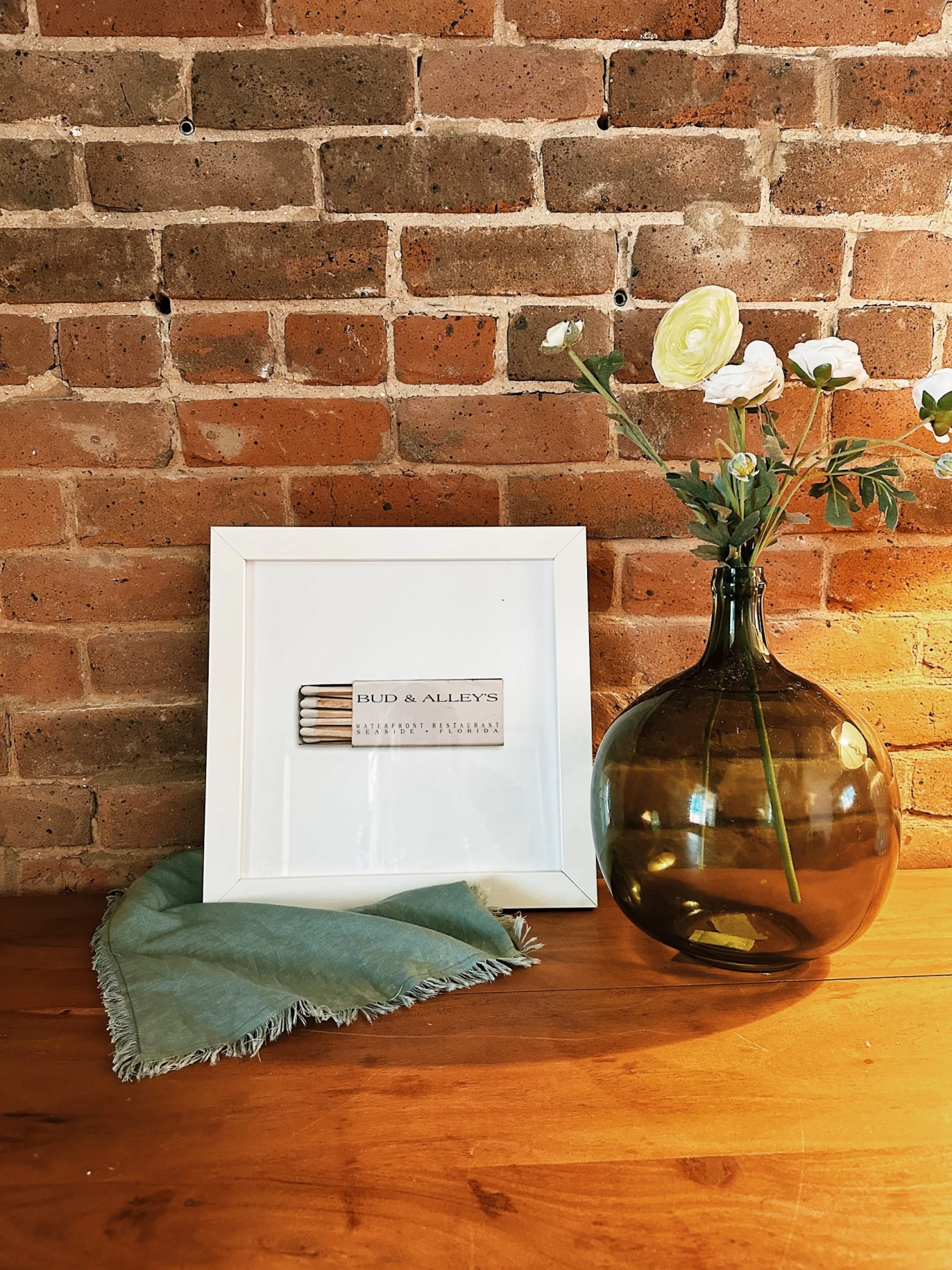 Match South: Bud & Alleys Seaside Restaurant White Frame 1 Match South: Bud & Alleys Seaside Restaurant White Frame